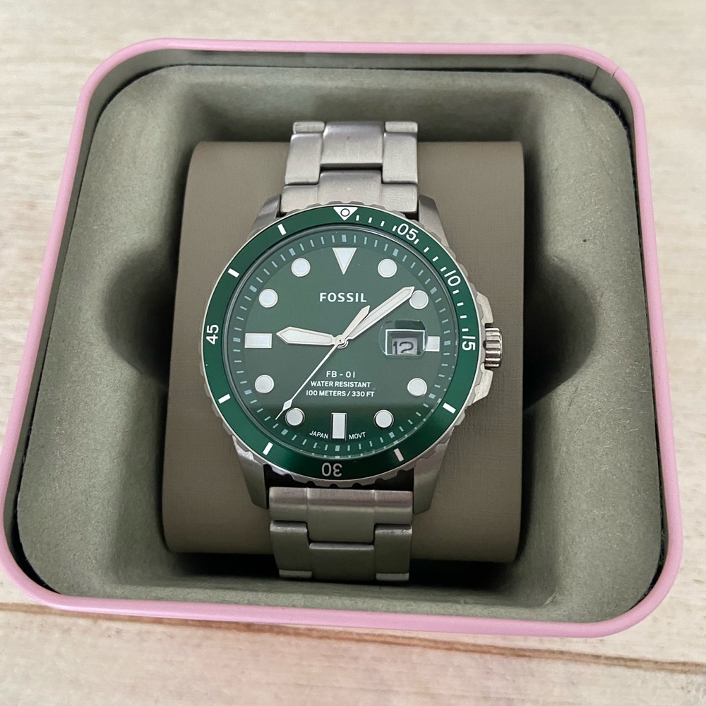 Green chronograph Fossil watch with Japan strap